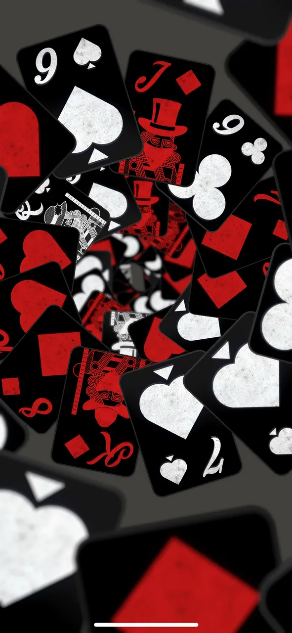 playing cards in a swirling pattern
