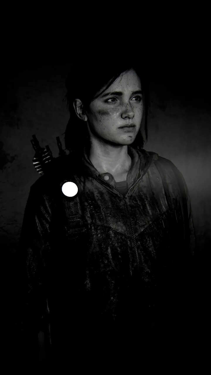 A bruised yet determined Ellie Williams in a black and white portrait shot